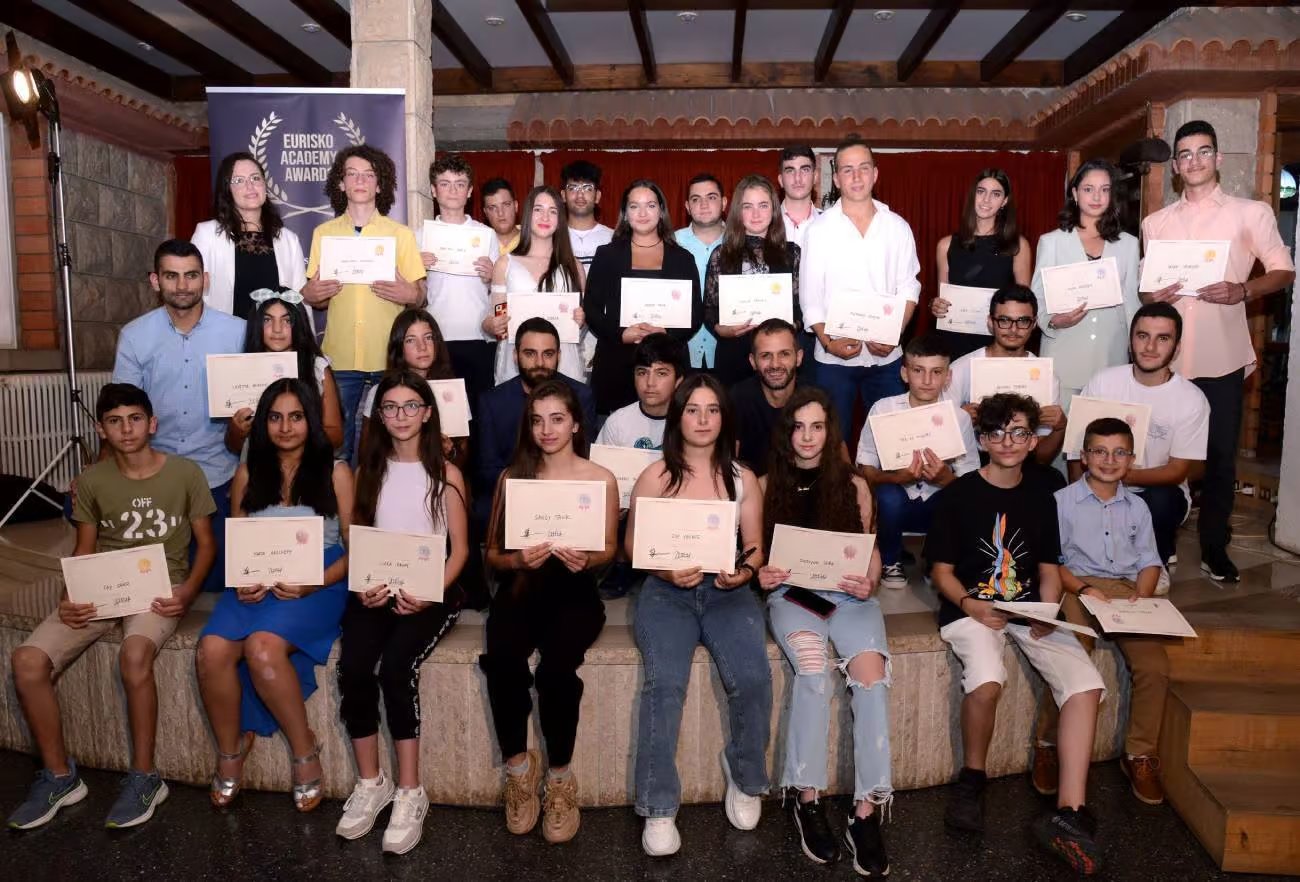Ziad Tawk (CTO / Co-founder, on the left) & Edgard Tawk (CEO / Co-founder, on the right) with the 25 winners of the 1st SoftGrad Schools Program Awards